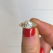 14K gold round cut moissanite signet wedding ring with accent stones and domed design for women
