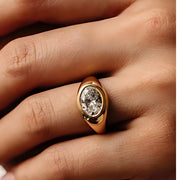 18K gold oval moissanite signet ring with 3 ct bezel set diamond band