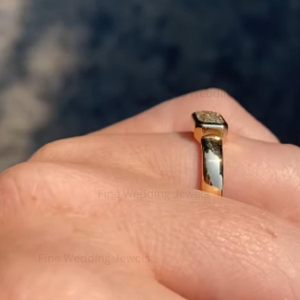 Emerald cut moissanite wedding band: 14k yellow gold bezel set ring