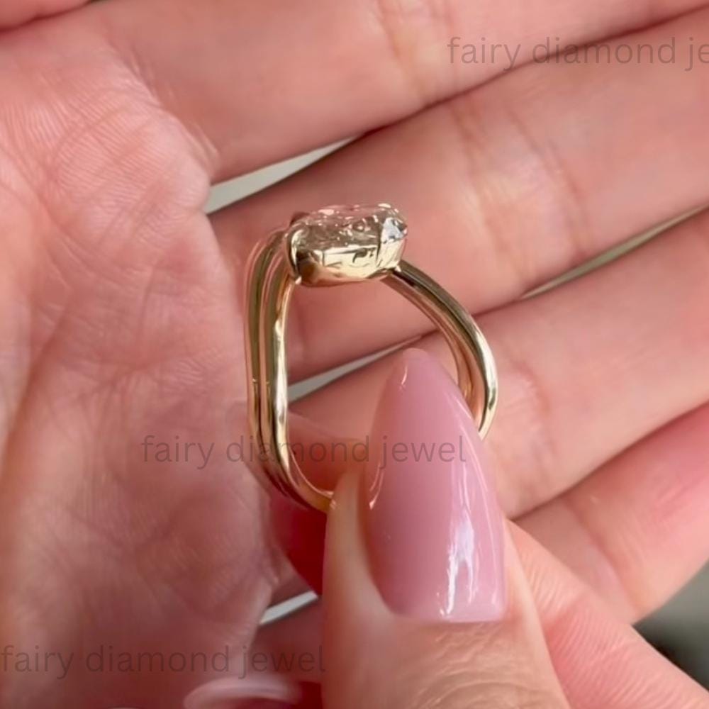 3ct Pear Moissanite Ring: 14k Yellow Gold Curved Chevron Band