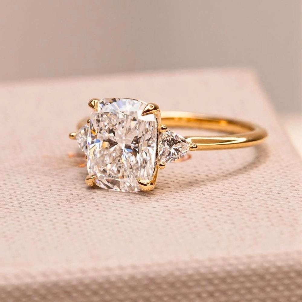 Cushion Moissanite Three Stone Ring: 14K Yellow Gold Engagement