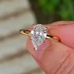 Load image into Gallery viewer, 14K Gold Pear Moissanite Ring: Floral Basket Hidden Halo Engagement
