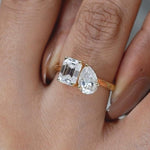 Load image into Gallery viewer, Moissanite Toi et Moi Ring: Pear &amp; Emerald Cut, 14K Yellow Gold
