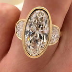 Load image into Gallery viewer, Antique Oval Moissanite Three Stone Ring: 14K Yellow Gold Bezel Wedding Band
