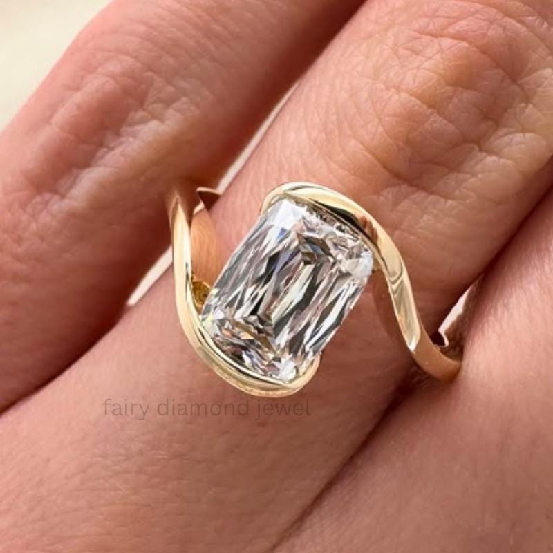 Criss cut moissanite engagement ring: 14k yellow gold bypass solitaire