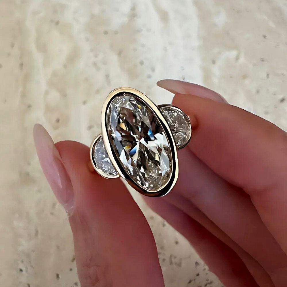 Antique Oval Moissanite Three Stone Ring: 14K Yellow Gold Bezel Wedding Band