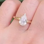 Load image into Gallery viewer, 14K Gold Pear Moissanite Ring: Floral Basket Hidden Halo Engagement
