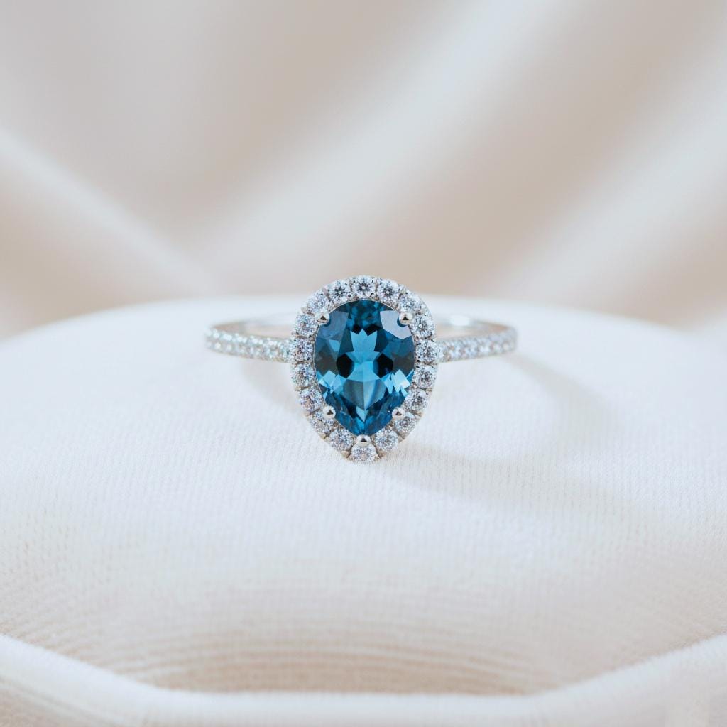 London Blue Topaz Engagement Ring: Rose Gold Sterling Silver, September Birthstone