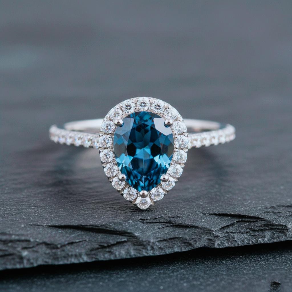 London Blue Topaz Engagement Ring: Rose Gold Sterling Silver, September Birthstone