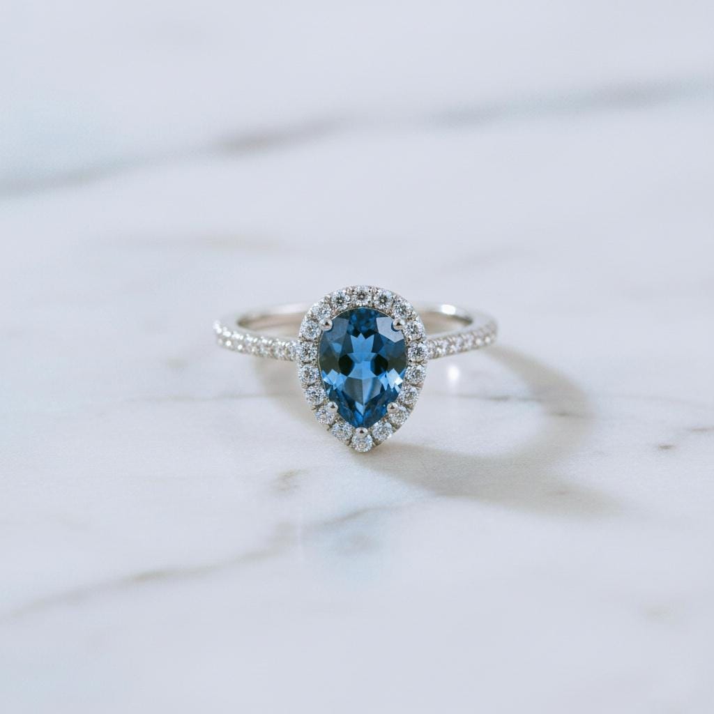 London Blue Topaz Engagement Ring: Rose Gold Sterling Silver, September Birthstone